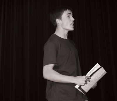 Junior Troy Guthrie reaheasres his lines for the upcoming musical The Music Man in the PAC. Photo by Halley Hollis