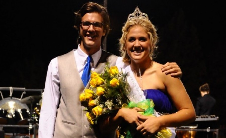 Crowning Moment: Senior poses with her escort senior Scott Coeffelt after she is crowned the homecoming queen. 