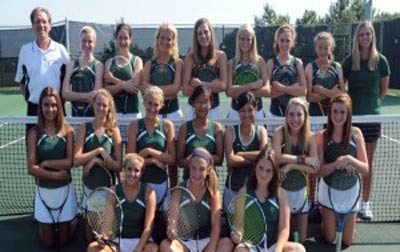 Green and glowing: Girls tennis poses for picture with district trophy.