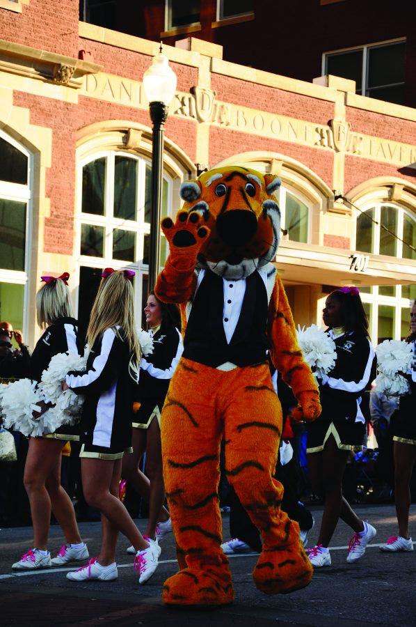 Truman in a tux: The striped mascot struts the parade in a formal attire.