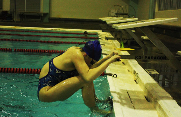 Swimmers balance high school, club teams