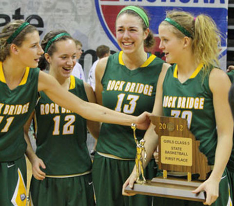 The girls celebrate their second state championship. Photo by Shaun Gladney.