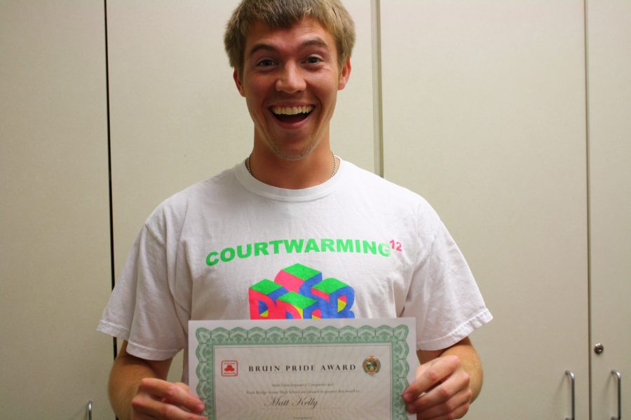 Winning: Senior Matt Kelly holds his certificate with true Pride and pure joy. Photo by Parker Sutherland