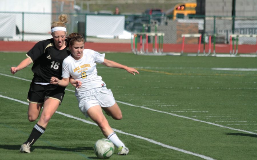Stolen: Sophomore Hannah Neilson stops the run and plays it back upfield. Photo by Asa Lory