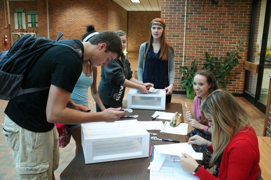 Voting for Homecoming court nominees began this morning and ceased at the start of first hour. Students were allowed to vote for 9 senior girls. Photo by Stazi Prost. 