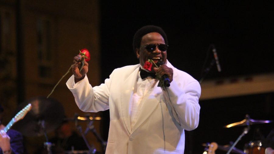 Legendary singer Al Green performs late Saturday at the annual Roots n Blues n BBQ festival. Green not only sang and danced, but showered the crowd with roses as well. Photo by Asa Lory