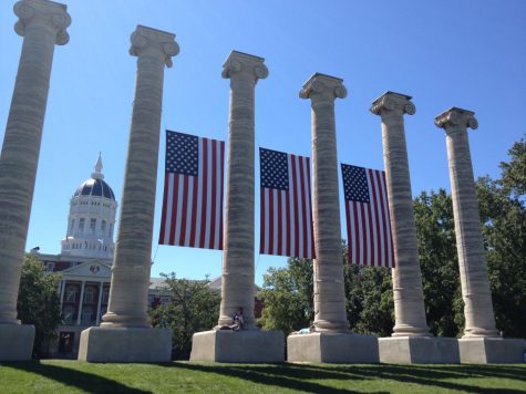 The six columns in Columbia flying the flags at half staff. Photo used with permission from Kirsten Buchanan.