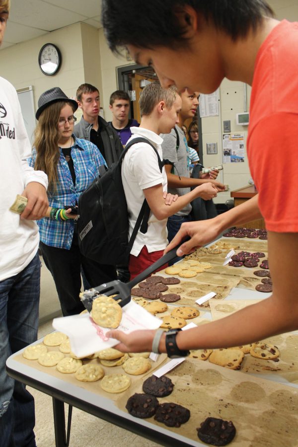 CACC goodies: Students travel to the Columbia Area Career Center to get a taste of the Otis Spunkmeyer cookies. Photo by Maddy Jones