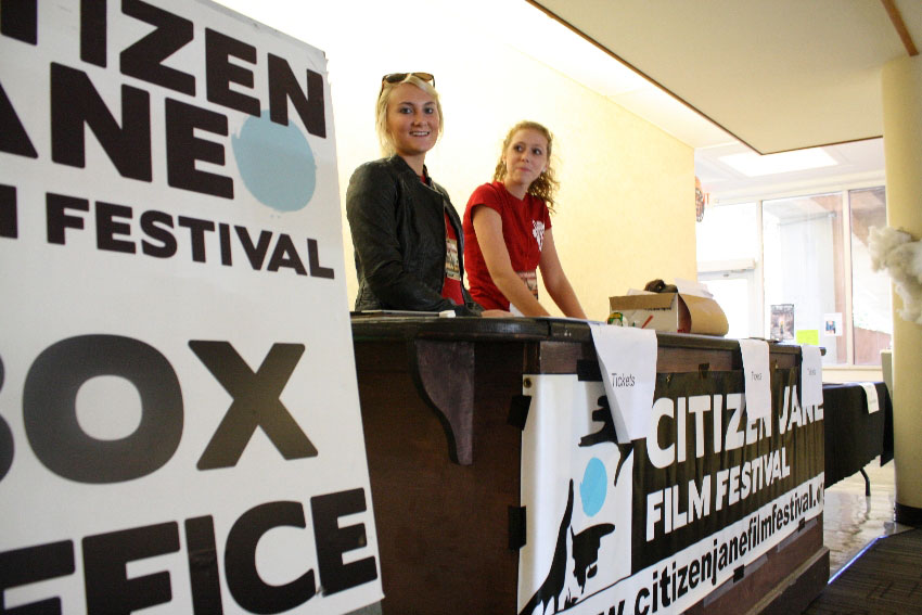 Seniors Carleigh Thrower and  Gracie Strawn work the Citizen Jane box office.