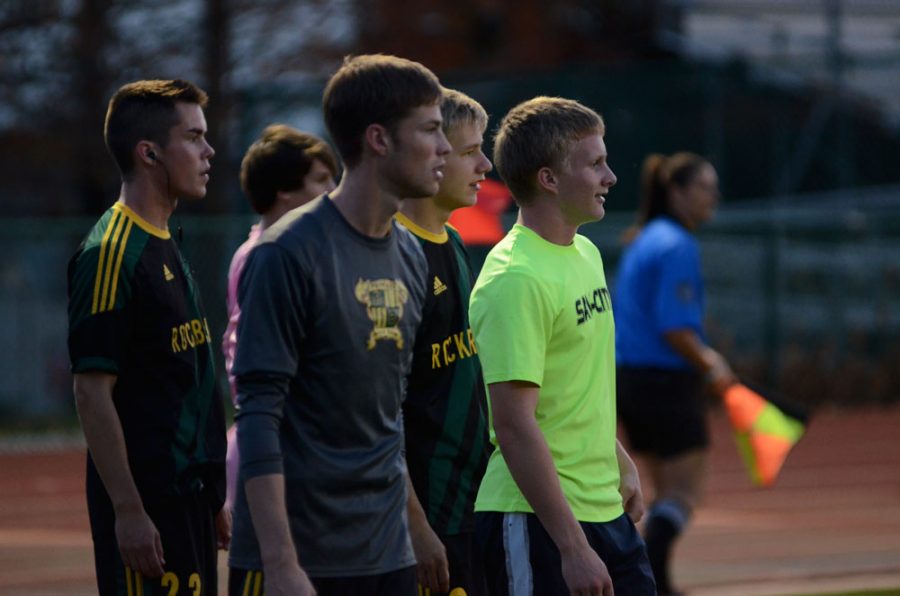 The+RBHS+Boys+Soccer+team+warms+up+before+Wednesdays+game+against+Whitfield%2C+with+senior+Andy+Barnes+up+front.+Photo+by+Asa+Lory
