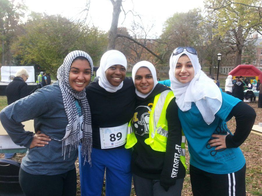 Juniors Inas Syed and Mubinah Khaleel pose with RBHS alumni Tahura Lodhi and Soumaya Necibi at the conclusion of the Rehab El-Buri Foundation Race to Action. Photo by Manal Salim