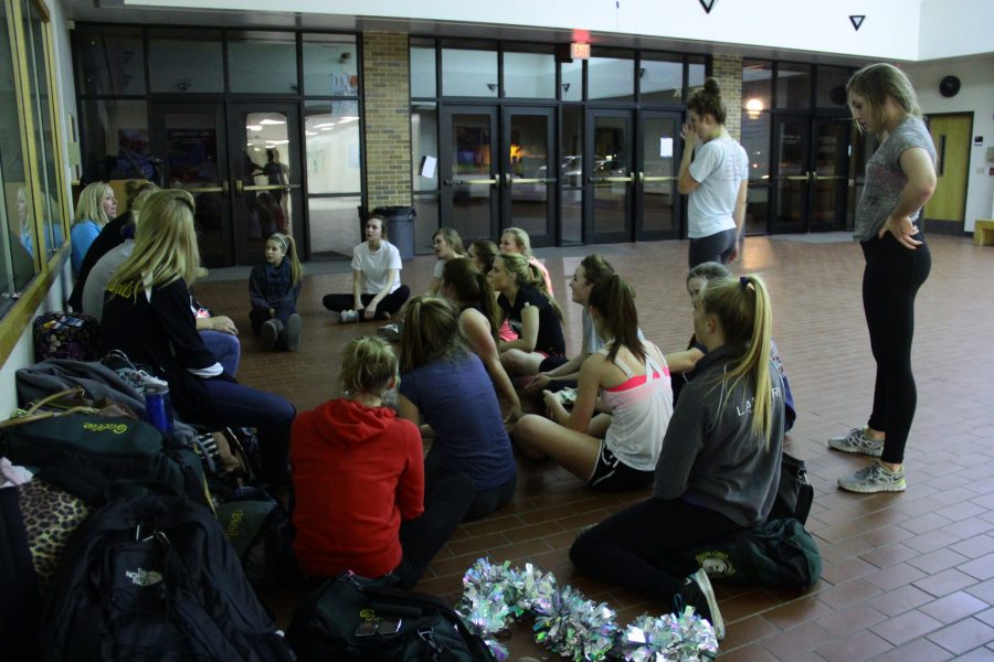 The Bruin Girls convene after practice on Thursday to prep for their competition on Saturday. Photo by Asa Lory