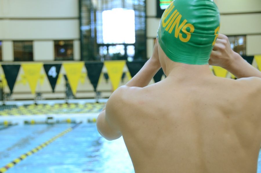 A RBHS swimmer prepares for a race at the MU Aquatic Center earlier this year. Swimmings Last Chance meet and the state championships are today. Photo by Erin Kleekamp