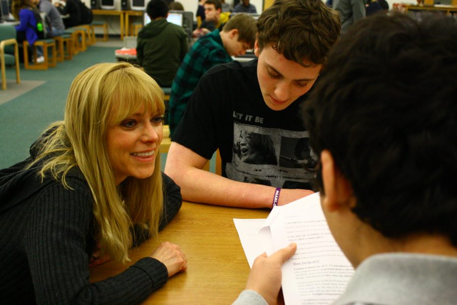 January 2013: Media Specialist, Gwen Struchtemeyer assists RBHS senior Connor Fraser with studying for the ACT. Many students take the generous opportunity offered by Structemeyer to better prepare them for achieving a higher score on the standardized test. Photo by Aniqa Rahman
Originally posted in 2013
