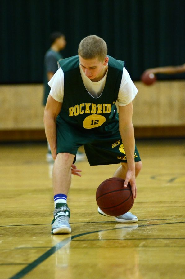 Junior Nick Norton practices dribbling after school. Photo by Patrick Smith.
