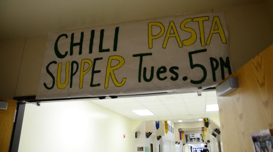 Posters for the Chili and Pasta Supper Jan. 22 line the walls of RBHS. Photo by Alyssa Sykuta