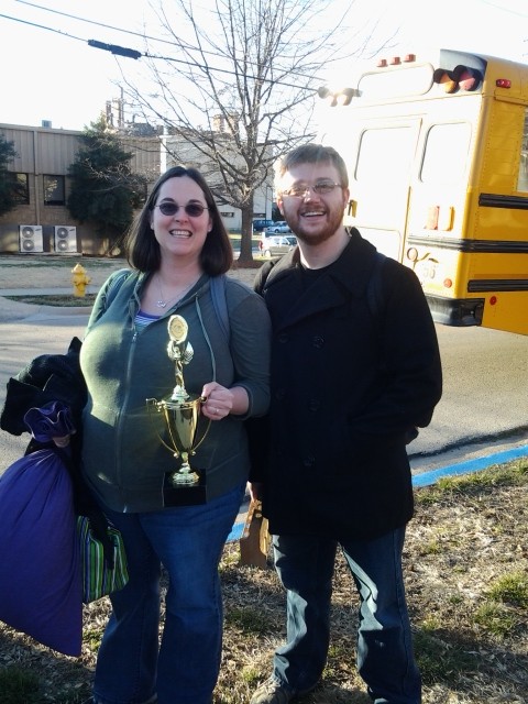 Coach Stephanie Harman and assistant coach Barry Still hold the overall 2nd place trophy that the RBHS Green team won today. Photo by Atreyo Ghosh