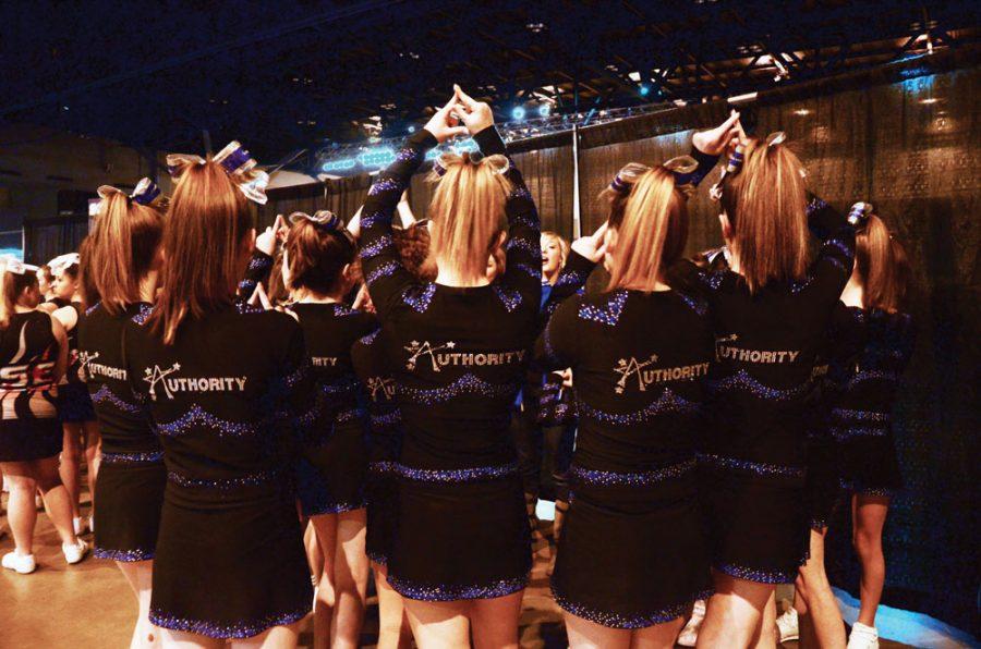 February+9%2C+a+cheer+squad+at+Authority+Gym+prepares+to+perform+in+front+of+the+judges+at+the+Jamfest+Nationals+competition.