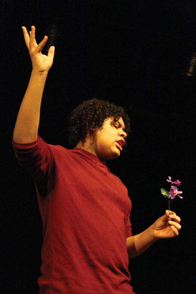 Fairy King Oberon, played by sophomore Seth Comara, holds up  a magical flower. When rubbed into the eyes of a sleeping person, it makes the sleeper fall in love with the first thing they see when they awake. He plots to use the flower on his wife, the fairy queen, as a practical joke.  