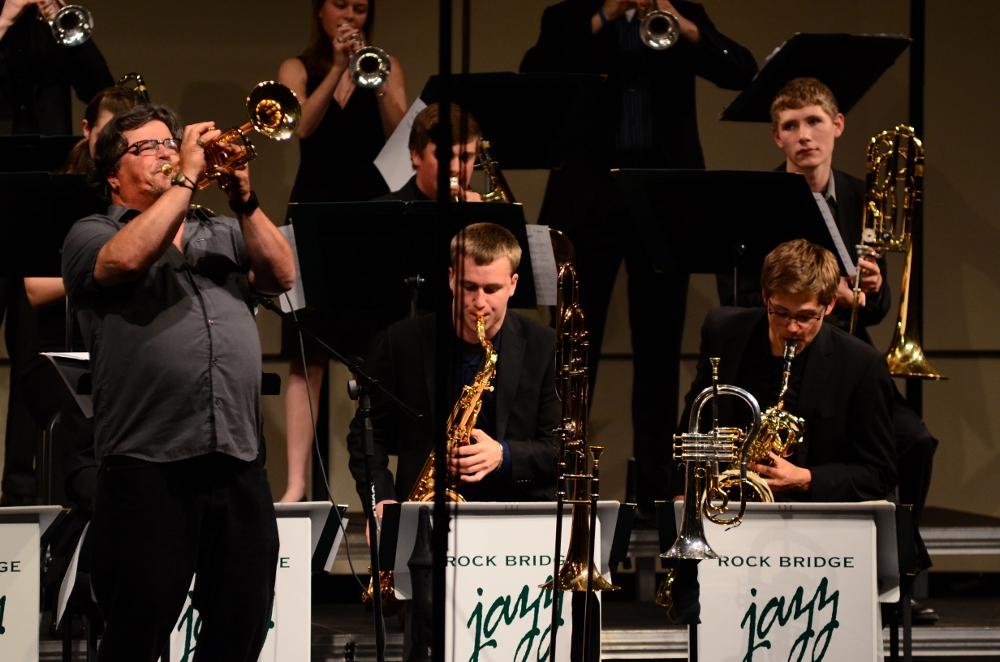 Mic Gillette solos during the Rock Bridge Jazz Ensemble's set. Gillette played with each school band at the concert: groups from Oakland, West, Jeff, Hickman and Rock Bridge. Photo by Asa Lory