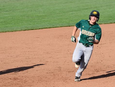 Sophomore Joe Barbee races to third base during Rock Bridges April 25 against Kirksville. Photo by Asa Lory