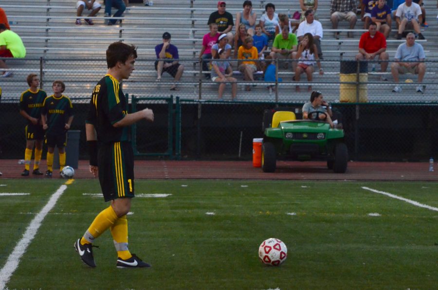 Junior Nicky Baird sets up for a mid-field kick at the Soccer Jamboree last night at Rock Bridge field.