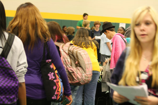 Underclassmen visit booths in the Auxiliary Gym during their Bruin Block on Student Involvement Day earlier in the school year. Photo by Renata Poet-Williams
