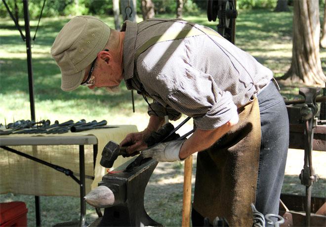 A local Blacksmith contributes to the ‘olden days’ aesthetic of the festival whilst preforming his craft.
