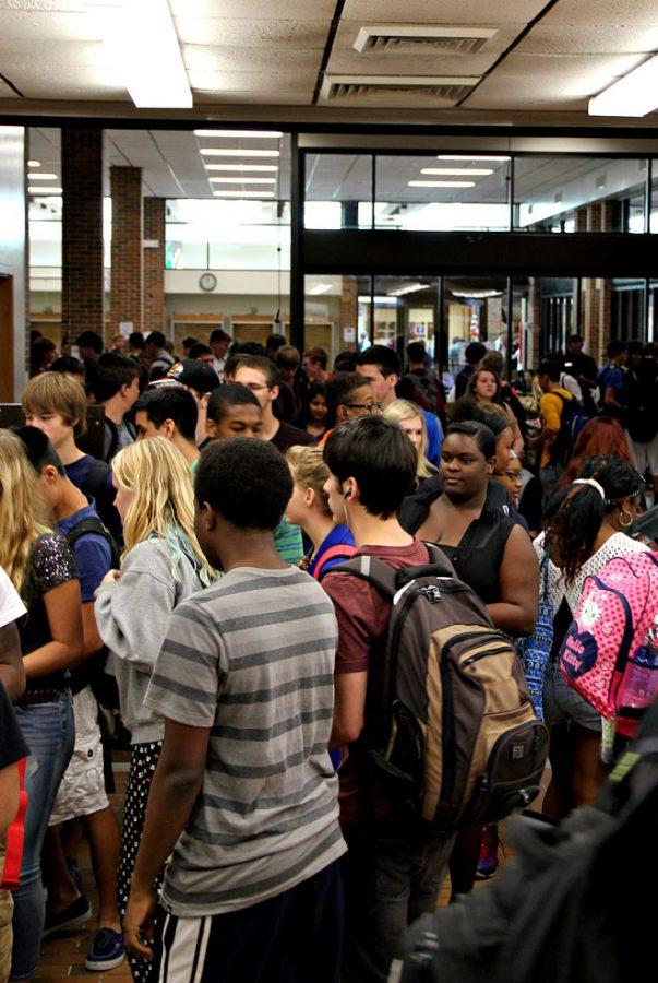 Students wait in the throng attempting to buy lunch Sept. 24 in the RBHS cafeteria. Photo by Brett Stover. 