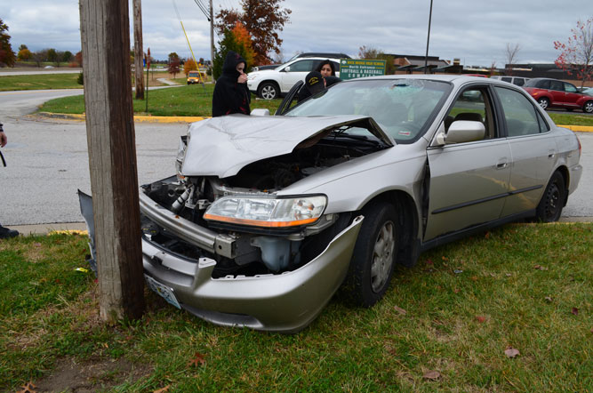 The car involved in the accident underwent serious damage after hitting a light post in the RBHS parking lot.
