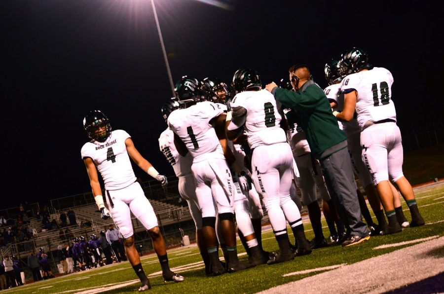 The Bruins kickoff return team meets with special teams coach Jamie Scholten. Rock Bridge beat Fort Zumwalt West 28-19 for the District Championship on Friday night.
Photo by Erin Kleekamp 