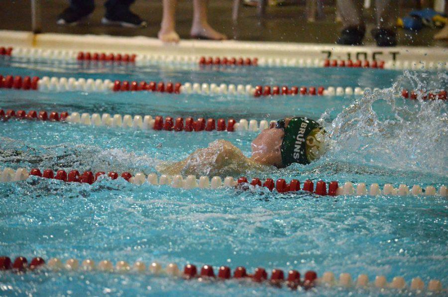 A swimmer representing RBHS competes in the boys 100 yard backstroke at the Last Chance meet. Photo by Karina Kitchen