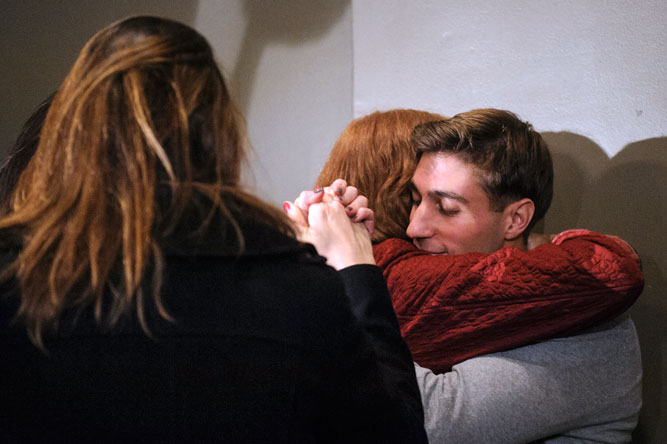 After nine years in prison as a convicted murderer, Ferguson hugs his mother at a news conference Nov. 12, 2013, one week after the appellate court overturned his conviction.