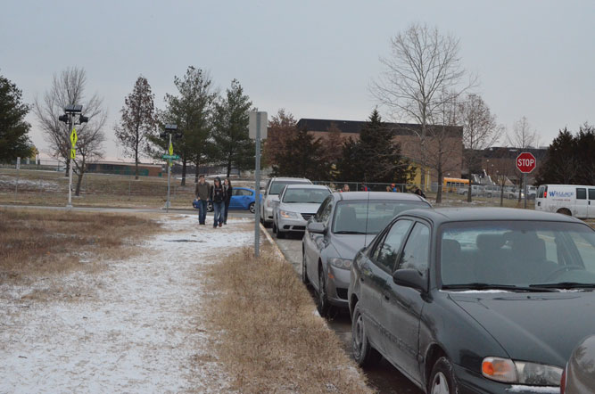 Signs of Winter: RBHS experienced its first significant accumulation of snow last weekend. Students walked through it toward their parked cars in ‘Sophomore Alley.’