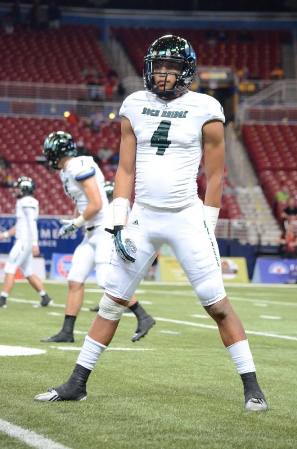 Junior A.J. Ofodlie warms up during the state football championship Nov. 29, 2013 at the Edward Jones Dome in St. Louis, Mo. Ofodile has earned a spot as an all-American football player on their Army 2015 team. Photo by Marissa Soumokil