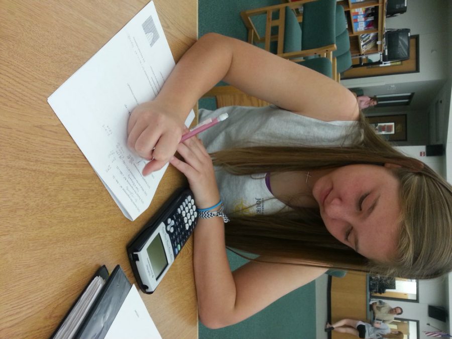Kelly+Wilkerson+studies+one+last+time+in+the+library+for+her+Quality+Core+Algebra+II+exam+on+May+30.