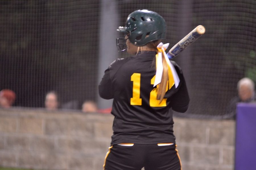 Senior shortstop Taylor Dillard lifts the bat off of her shoulder as she prepares for the upcoming pitch during the district quarterfinal against BHS. The Bruins would ultimately prevail powering past the Spartans 11-1.Dillard recorded an RBI ground rule double and scored twice in the game. Photo by Madeline Kuligowski.