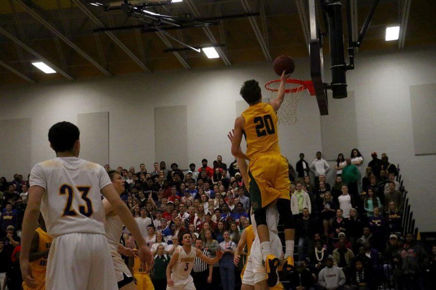 Ryan Kreklow makes a layup during Tuesdays 64-54 rivalry win over the Kewpies. Kreklow led the Bruins with 21 points.