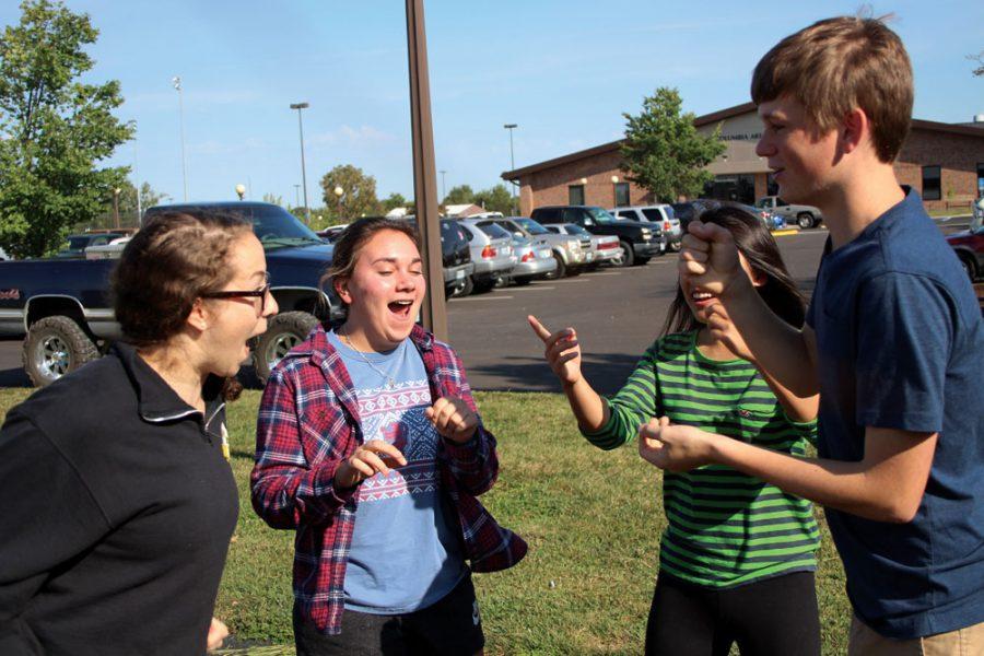 AP Biology students Mariah Fitzpatrick, Clara Brand, Hannah Chen and Clayton Warder mingle with each other during a break from class. This year, administrators requested teachers to add more physical activity during classes this year.
Photo by Jae Rhee