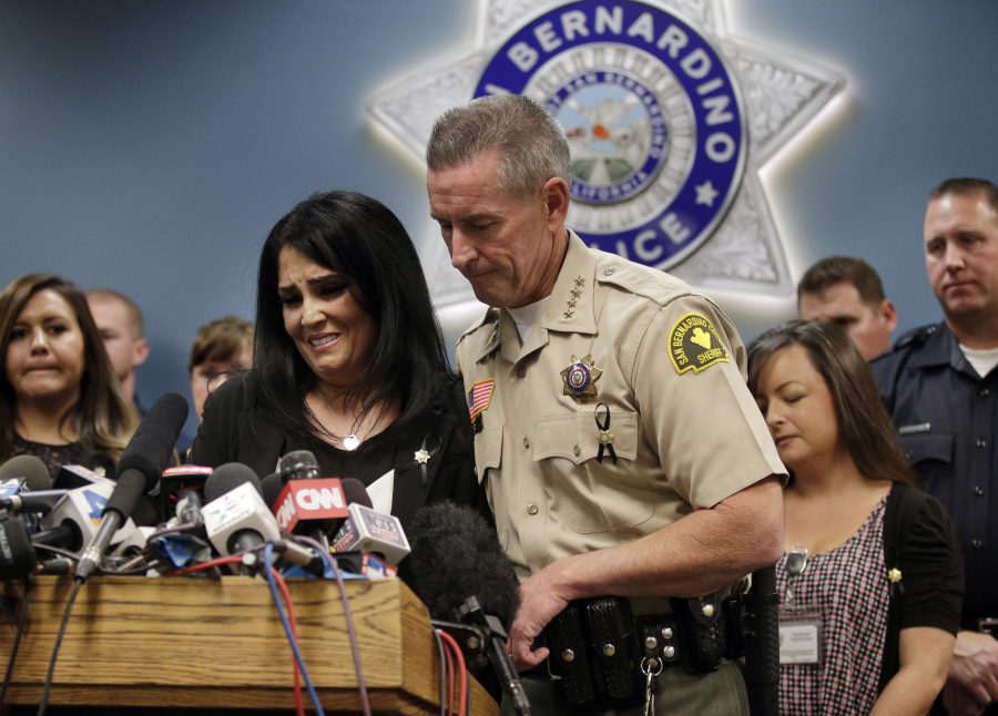 San+Bernardino+County+Sheriff+John+McMahon%2C+right%2C+comforts+dispatcher+Michelle+Rodriguez+during+a+news+conference+with+the+first+responders+who+were+at+the+scene+of+last+weeks+fatal+shooting+at+the+Inland+Regional+Center%2C+Tuesday%2C+Dec.+8%2C+2015%2C+in+San+Bernardino%2C+Calif.+%28AP+Photo%2FJae+C.+Hong%29