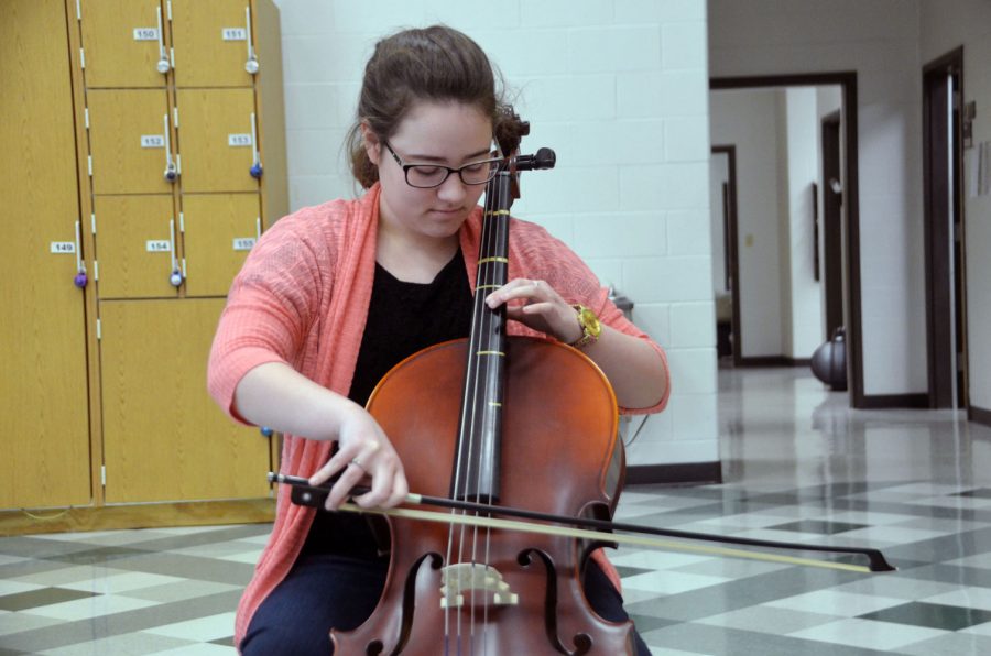 Junior, Alli K, plays the cello.