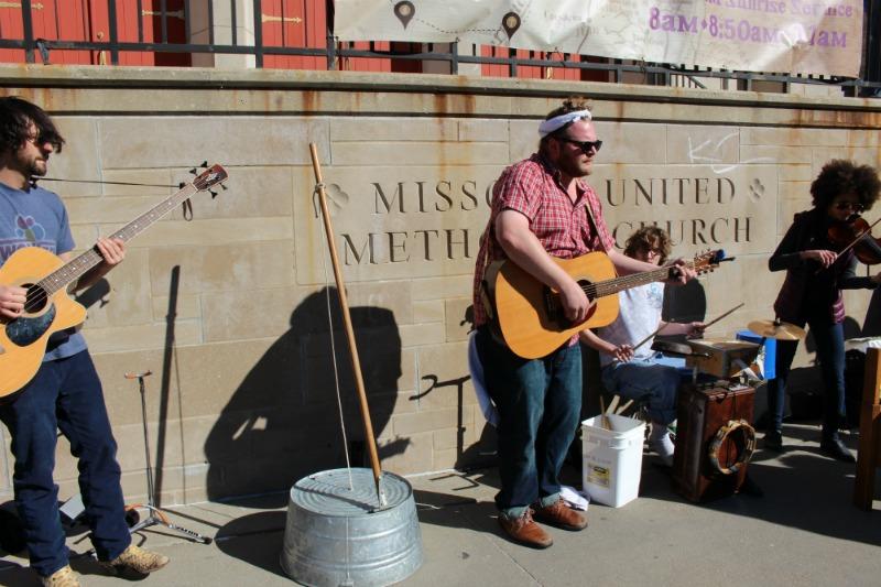 A band plays in front of the Missouri United Methodist Church. Many other performers played along the streets of downtown throughout the day as well. True/False attendees had the choice to tip the bands.