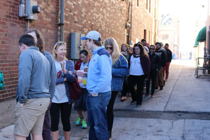 Movie-goers and journalists alike stand in the Q line at the Forrest Theater venue to watch the five o'clock showing of "The Prison in Twelve Landscapes". The film, directed by Brett Story, highlights America's high incarceration rates in black communities.
