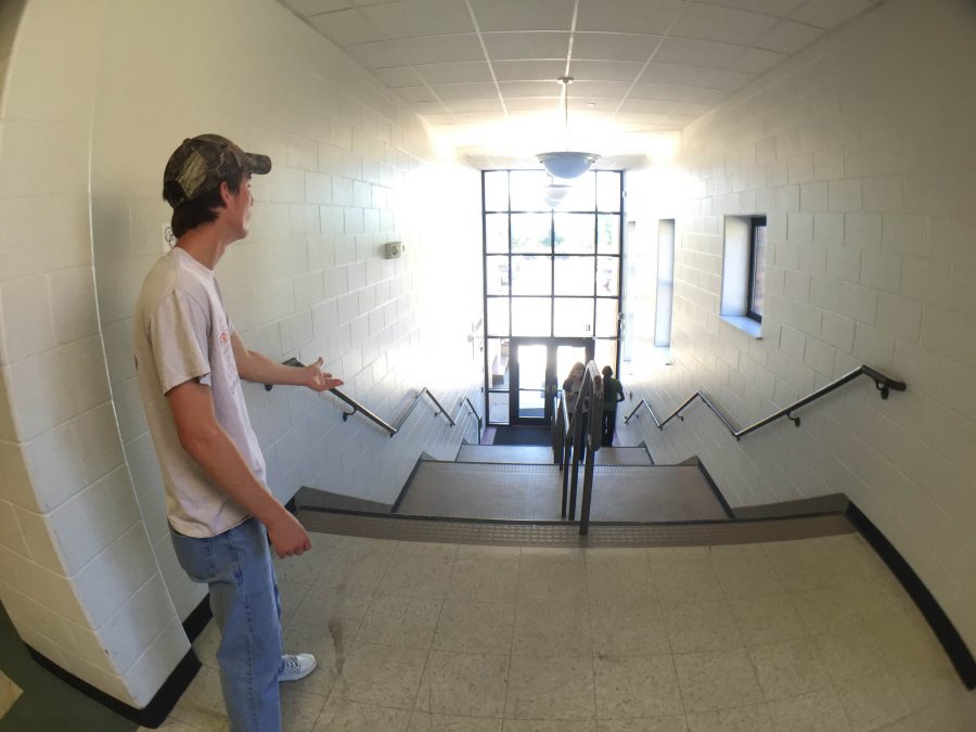 Sophomore Dom Zenner stares longingly at the south doors during his AUT.
 Photo by Tyson Jamieson