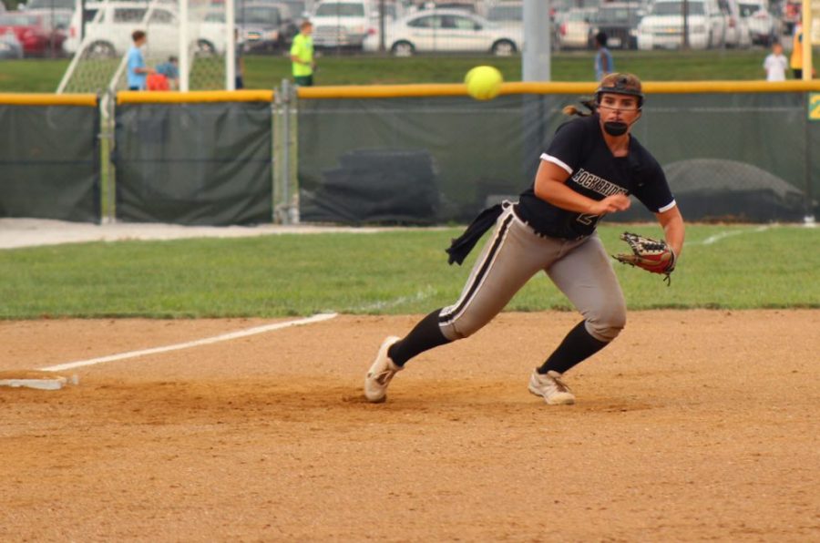 Junior third baseman Ashleigh McKinley hustles to field the ball in order to get an out at first. Photo by Cassidy Viox