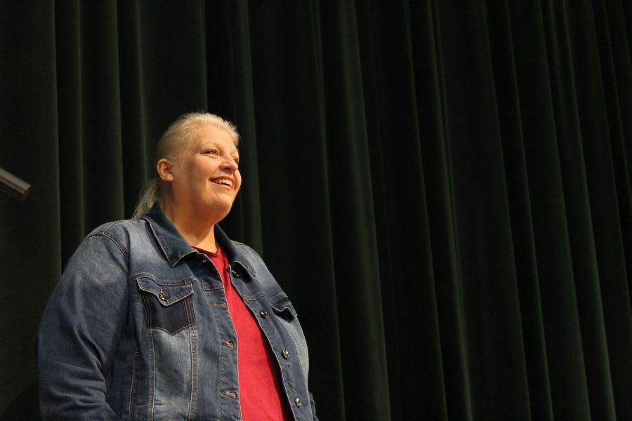Special Education teacher Nita Cummings receiving recognition at the Flashback Assembly on April 27th.    Image by George Frey.