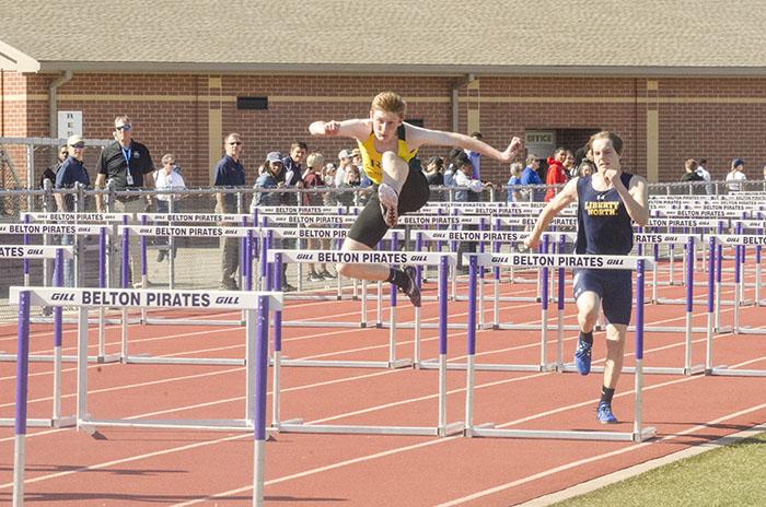 Sophomore Zach Britton runs in the 100 meter hurdles at the Belton varsity meet.