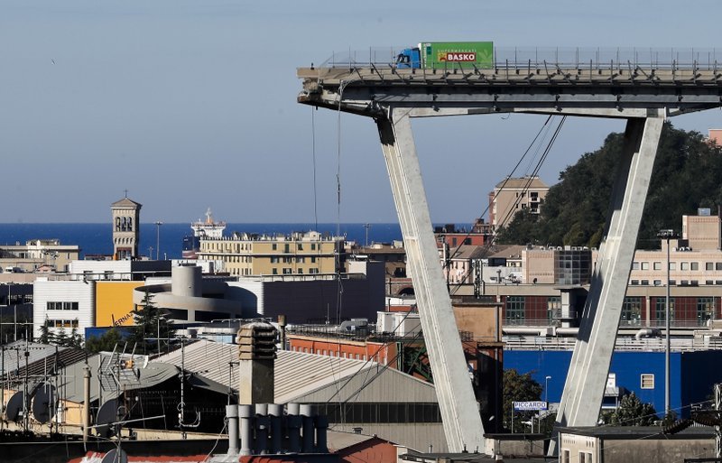 A truck stands on the edge of the collapsed Morandi Bridge on Aug. 15 in Genoa, Italy.
Photo by Antonio Calanni/The Associated Press 