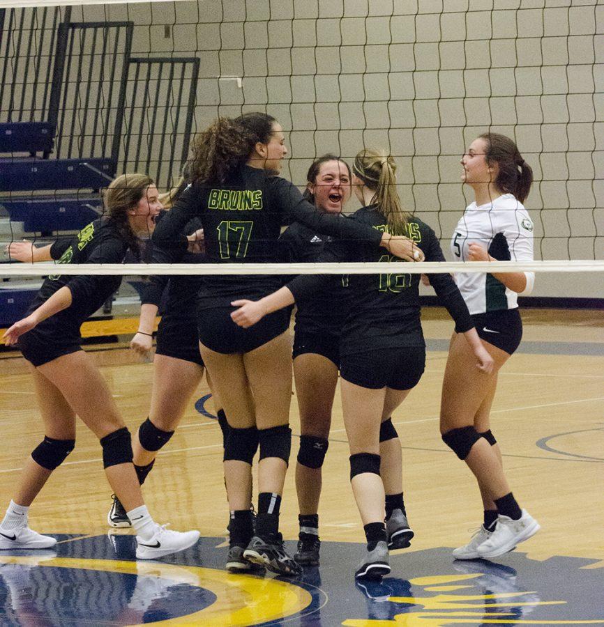 Bruins celebrate at volleyball Jamboree held at Battle Aug 23. Photo by Allie Pigg