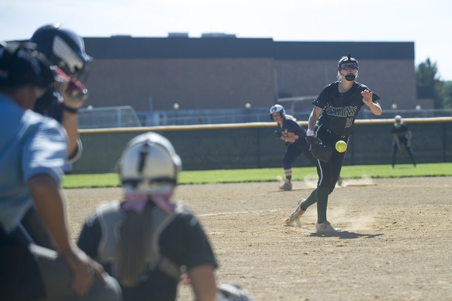 Sophomore pitcher and outfielder Ella Schouten pitches to Holt High School Sept. 22. The Bruins lost the home game (0-5). They will play again in the Hickman Tournament this weekend. Photo by Sophie Eaton. 